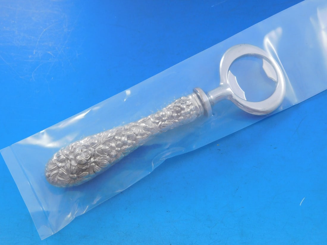 Stieff Rose Sterling Silver Custom Bottle Opener 5.5 Inch: Stieff Rose Sterling Silver Custom Bottle Opener 5.5 Inch Elevate your barware collection with this exquisite Rose by Stieff Sterling Silver Bottle Opener. Crafted by Stieff, this bottle opener featur