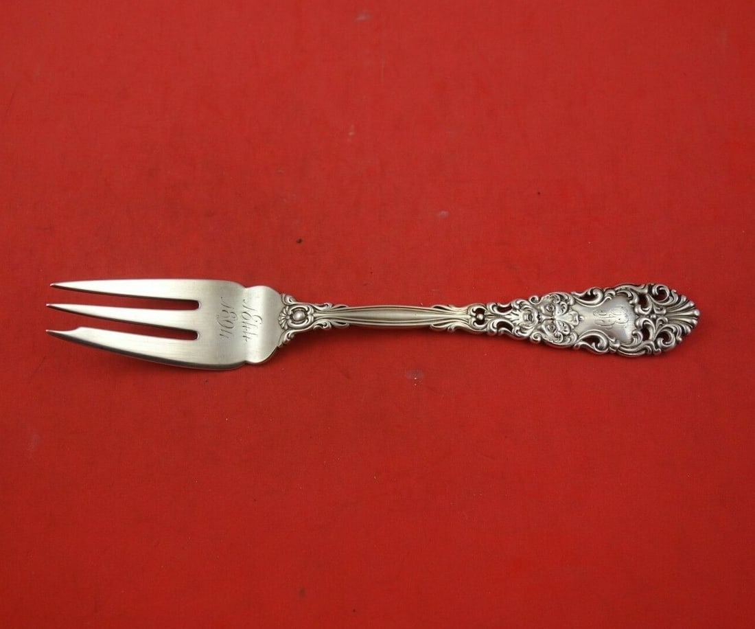 Dominick & Haff Renaissance Sterling Silver 3-Tine Pie Fork 7 1/8": Dominick & Haff Renaissance Sterling Silver 3-Tine Pie Fork 7 1/8" This exquisite pie fork from the Renaissance pattern by Dominick & Haff features a 3-tine design with a pierced handle, crafted from