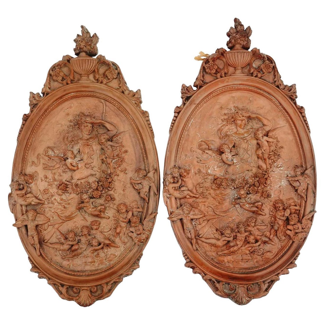 Set of Two Neoclassical Plaster Bas-Relief Wall Plaques with Goddess and Angels: Set of Two Neoclassical Plaster Bas-Relief Wall Plaques with Goddess and Angels This matched pair of neoclassical bas-relief plaques is crafted from molded plaster with a terracotta patina. Each plaqu