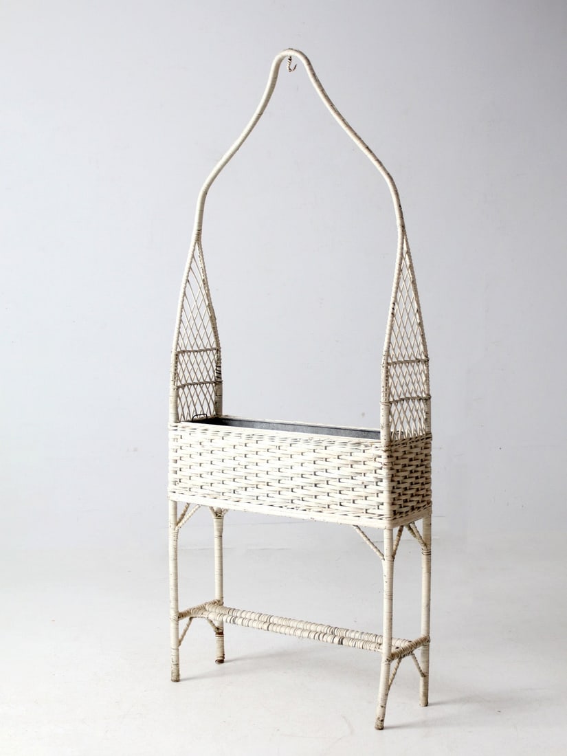 Antique Wicker Plant Stand with Hook and Tin Liner: Antique Wicker Plant Stand with Hook and Tin Liner This charming antique wicker planter basket stand features a rectangular design with a creamy white painted finish and a removable galvanized tin lin