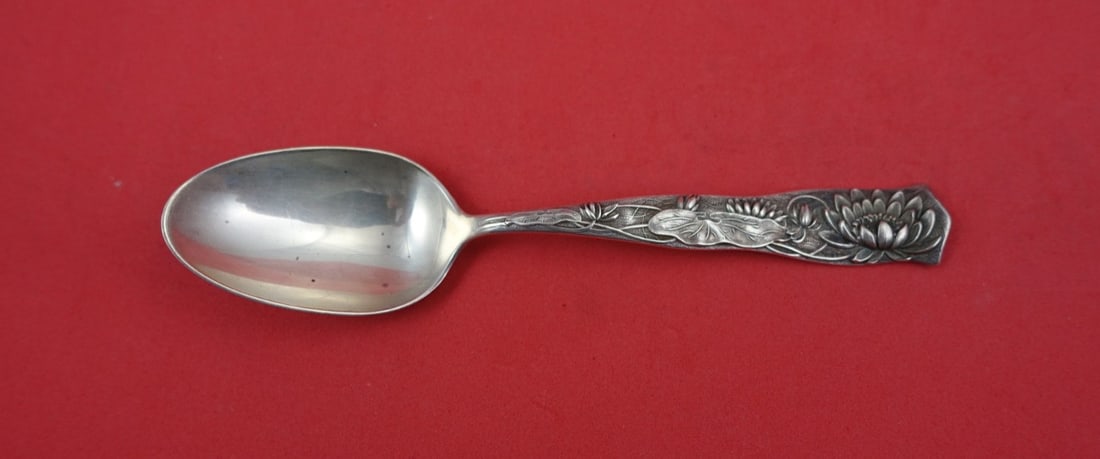 Sterling Silver Flora Pattern Teaspoon with Lotus Flower by Shiebler 5 3/4 Inch: Sterling Silver Flora Pattern Teaspoon with Lotus Flower by Shiebler 5 3/4 Inch This is a sterling silver teaspoon from the Flora pattern by Shiebler, featuring a lotus flower design. The spoon measur