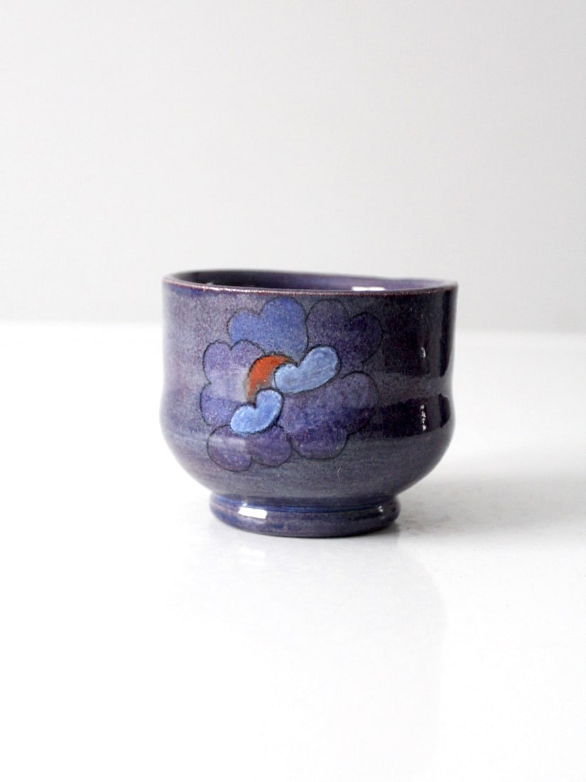 Handmade Vintage Studio Pottery Cachepot with Heart-Cloud Design: Handmade Vintage Studio Pottery Cachepot with Heart-Cloud Design This vintage studio pottery cachepot vase showcases a unique handmade design featuring a rich purple glaze adorned with a charming hand