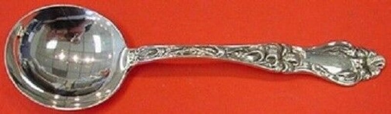 Frank Whiting Sterling Silver Lily Cream Soup Spoon 5.75 Inch Heirloom: Frank Whiting Sterling Silver Lily Cream Soup Spoon 5.75 Inch Heirloom This exquisite cream soup spoon from the renowned Frank Whiting brand features the elegant Lily pattern. Measuring 5 3/4 inches,