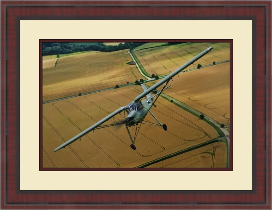 Fi 156 STORCH Aviation Print by Philip Makanna Custom Framed Art: Fi 156 STORCH Aviation Print by Philip Makanna Custom Framed Art This stunning aviation print features the Fi 156 STORCH, beautifully presented in a custom frame. The artwork is a licensed reprint by
