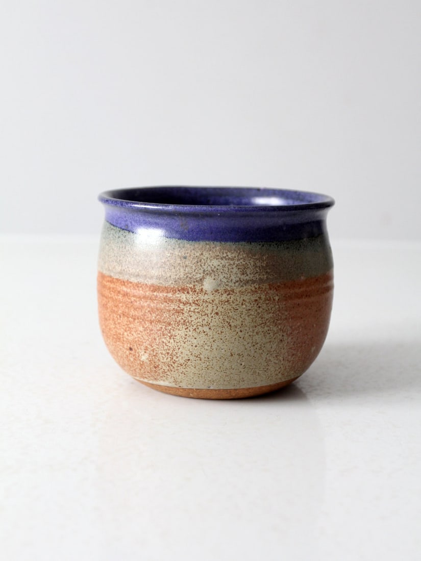 Vintage Handmade Studio Pottery Vase with Terracotta and Blue-Violet Glaze: Vintage Handmade Studio Pottery Vase with Terracotta and Blue-Violet Glaze This vintage handmade studio pottery vase showcases a beautiful layered glaze in terracotta, beige, and blue-violet tones. Th