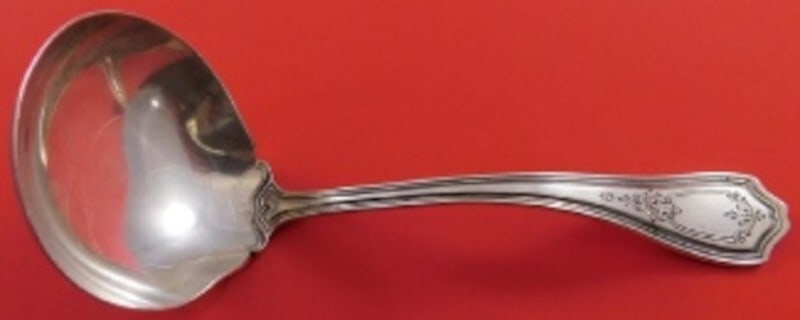 Reed & Barton Hepplewhite Chased Sterling Silver Gravy Ladle 6.25": Reed & Barton Hepplewhite Chased Sterling Silver Gravy Ladle 6.25" Add elegance to your dining experience with this exquisite Hepplewhite Chased Gravy Ladle from Reed & Barton. Crafted from high-quali