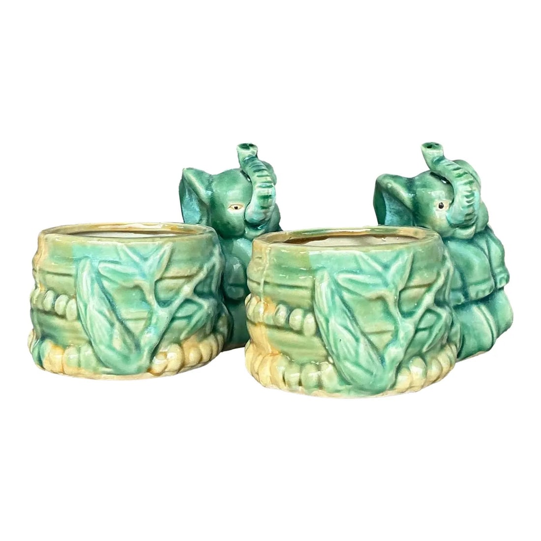 Charming Vintage Asian Elephant Ceramic Planters Pair: Charming Vintage Asian Elephant Ceramic Planters Pair Add a whimsical touch to your decor with this delightful pair of vintage Asian elephant planters. Made from glazed ceramic in earthy green tones,