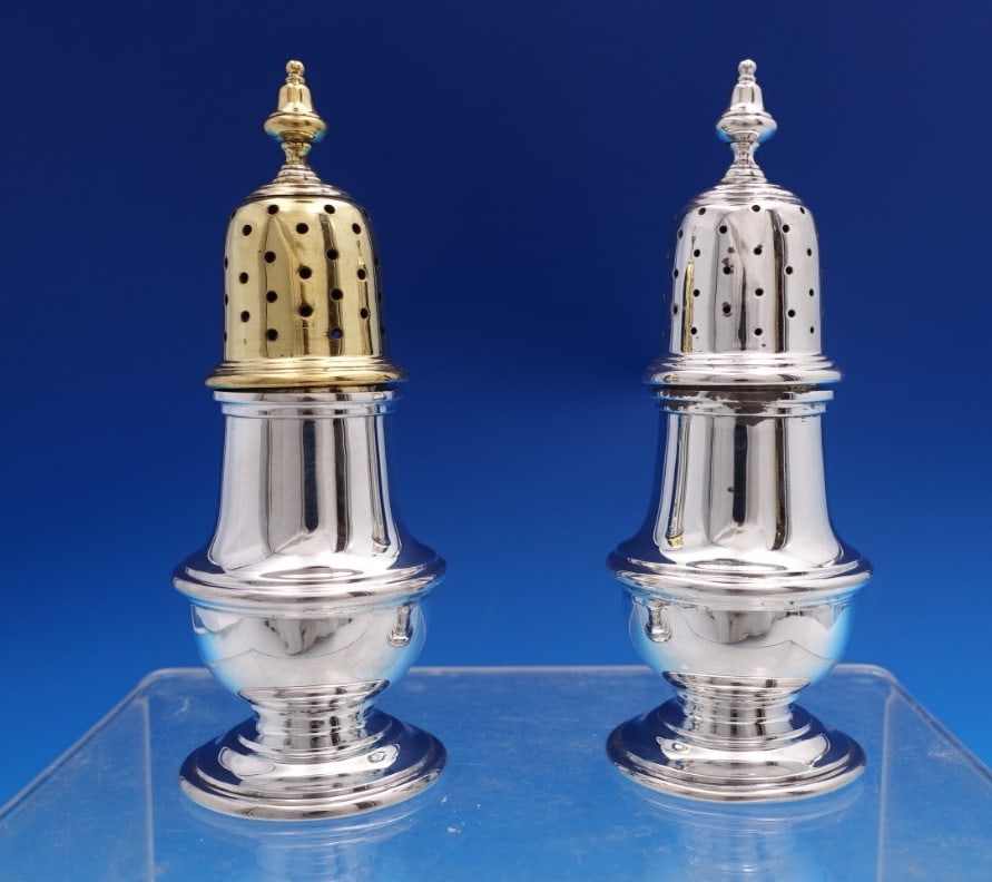 Tiffany & Co Faneuil Sterling Silver Salt and Pepper Shaker Set 2pc: Tiffany & Co Faneuil Sterling Silver Salt and Pepper Shaker Set 2pc Enhance your dining experience with this exquisite two-piece salt and pepper shaker set from Tiffany & Co., featuring the elegant Fa