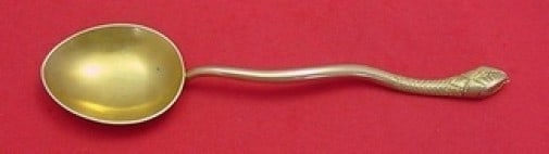 German Sterling Silver Soup Spoon with Snake Vermeil Design: German Sterling Silver Soup Spoon with Snake Vermeil Design This exquisite German sterling silver soup spoon features a striking figural design with a snake vermeil accent. Measuring 7 3/4" in length,