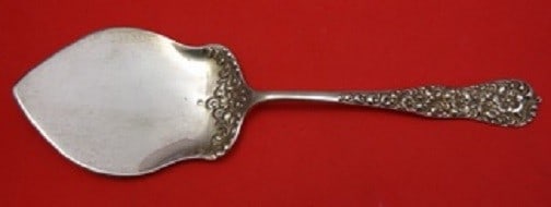 Dominick & Haff Rococo Sterling Silver Pie Server 9 3/4" Monogrammed: Dominick & Haff Rococo Sterling Silver Pie Server 9 3/4" Monogrammed This exquisite pie server showcases the elegant Rococo design by Dominick & Haff, crafted from high-quality sterling silver. Measur