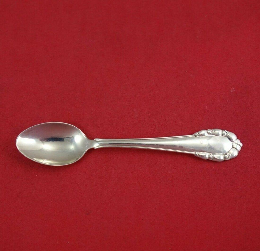 Georg Jensen Lily of the Valley Sterling Silver Teaspoon 5 Inch: Georg Jensen Lily of the Valley Sterling Silver Teaspoon 5 Inch This exquisite teaspoon, part of the Lily of the Valley pattern by Georg Jensen, showcases elegant craftsmanship in sterling silver. Mea