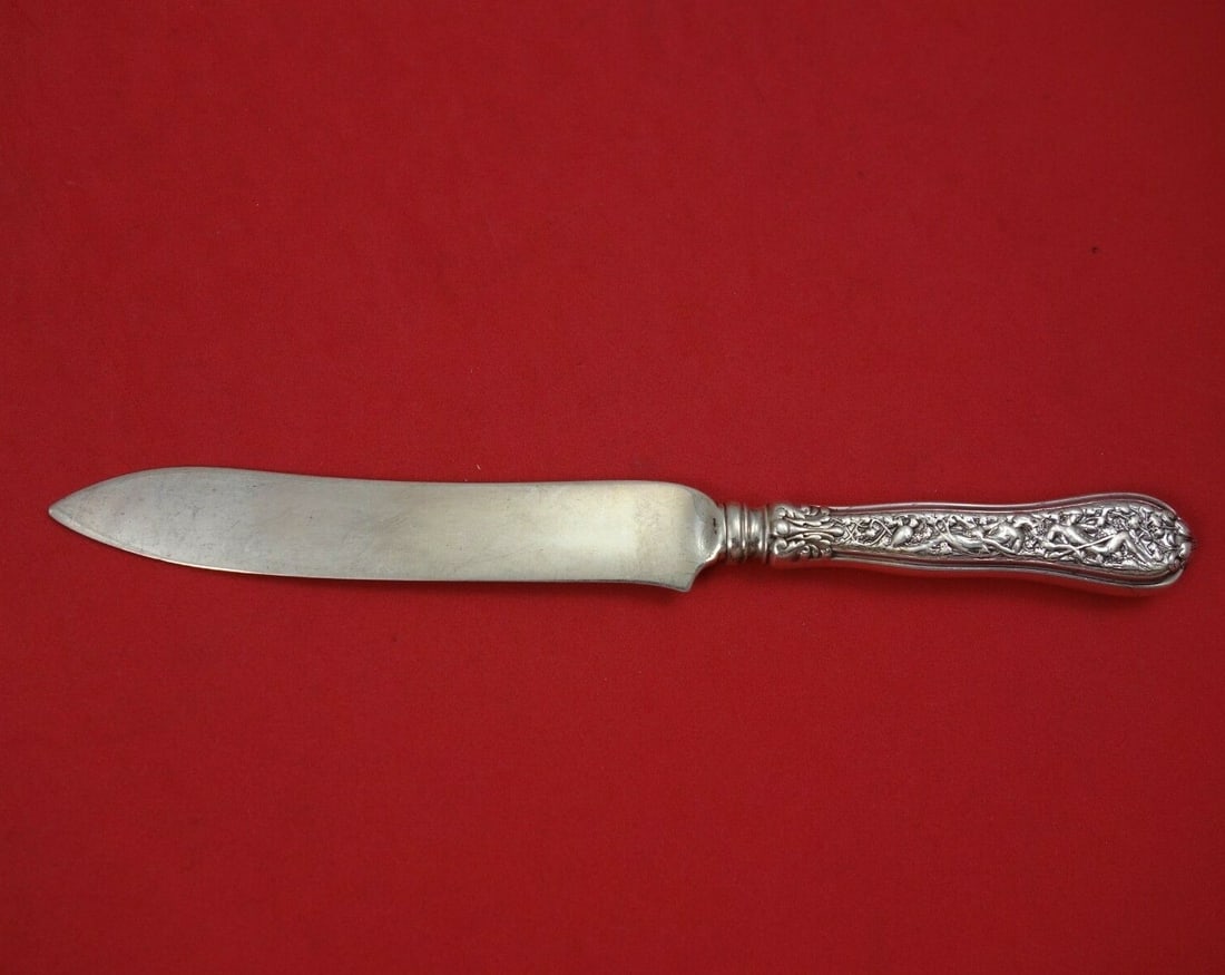 Tiffany & Co Olympian Sterling Silver Trout Knife 7 5/8" Monogrammed: Tiffany & Co Olympian Sterling Silver Trout Knife 7 5/8" Monogrammed This exquisite trout knife, crafted by Tiffany & Co., features a stunning design in the Olympian pattern. Made of high-quality ster