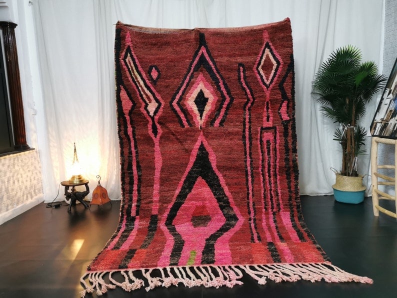 Handmade Moroccan Red Rug 100% Sheep Wool 8 x 5 Feet: Handmade Moroccan Red Rug 100% Sheep Wool 8 x 5 Feet This authentic and beautiful custom handmade red rug is a stunning addition to any space. Crafted by skilled Berber women weavers in the Middle Atl