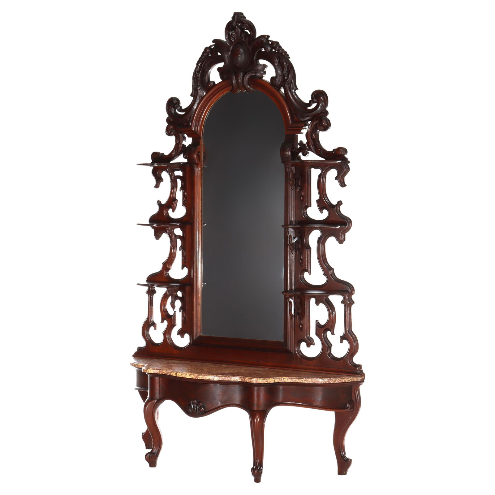 Late 19th Century Carved Walnut Pier Mirror with Rouge Marble Top: Late 19th Century Carved Walnut Pier Mirror with Rouge Marble Top This impressive antique Rococo Revival pier mirror dates to around 1890 and features finely carved walnut construction. The mirror is
