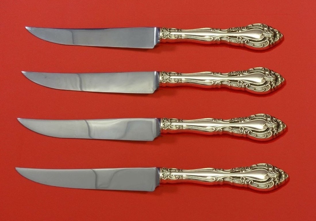 Alvin Vivaldi Sterling Silver 4pc Steak Knife Set Custom 8 1/2": Alvin Vivaldi Sterling Silver 4pc Steak Knife Set Custom 8 1/2" Elevate your dining experience with this exquisite Vivaldi by Alvin Sterling Silver Steak Knife Set. Crafted with a sterling silver holl
