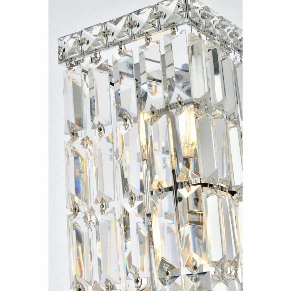 Maxime 2-Light Chrome Wall Sconce with Royal Cut Crystal Accents: Maxime 2-Light Chrome Wall Sconce with Royal Cut Crystal Accents This modern wall sconce light fixture features a polished chrome finish with Royal Cut clear crystal accents, offering a stylish lighti