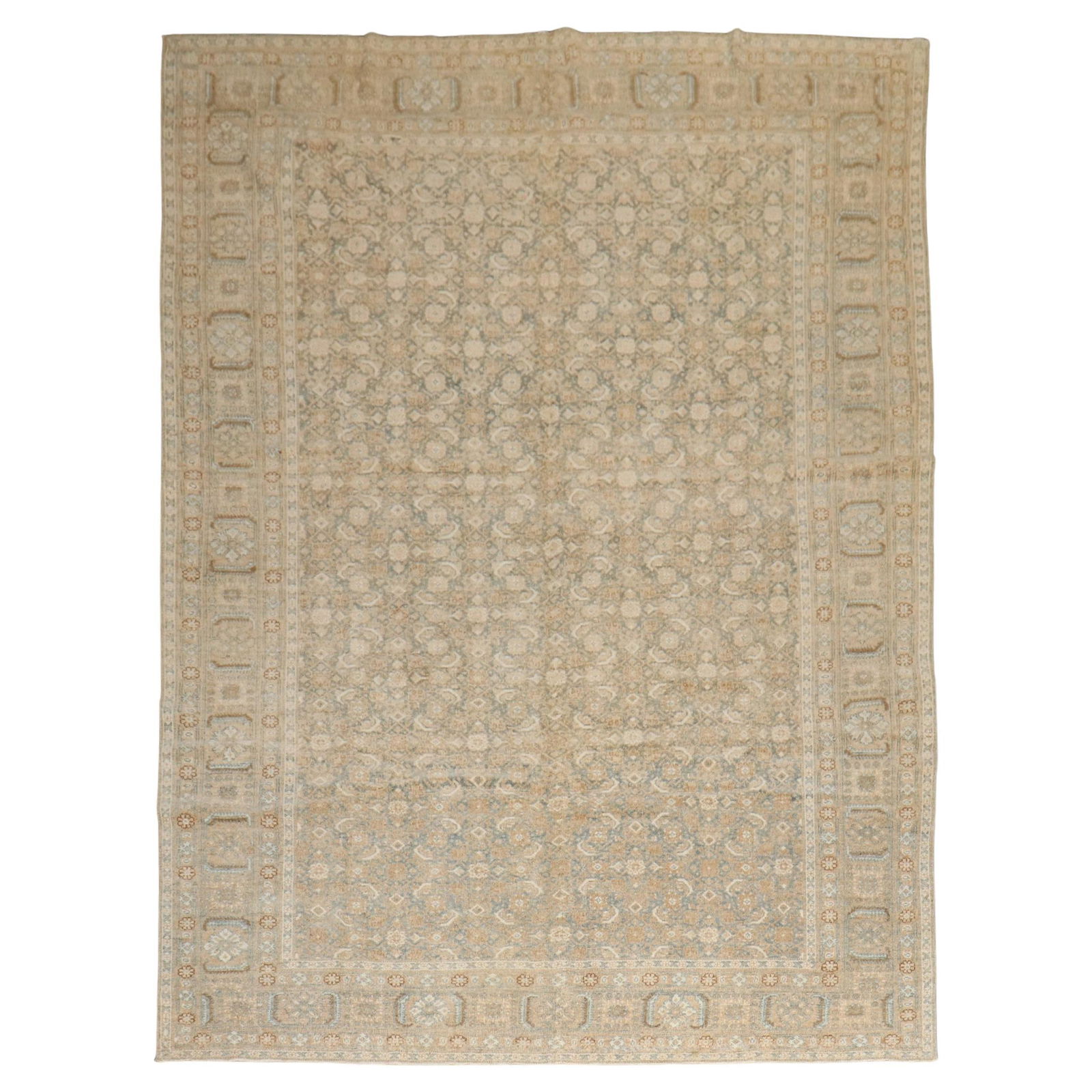 Antique Persian Tabriz Hand-Woven Wool Carpet Soft Green 80 x 108: Antique Persian Tabriz Hand-Woven Wool Carpet Soft Green 80 x 108 Explore the exquisite beauty of this Antique Persian Tabriz Carpet, a stunning fusion of soft green and brown hues. Hand-woven in Iran