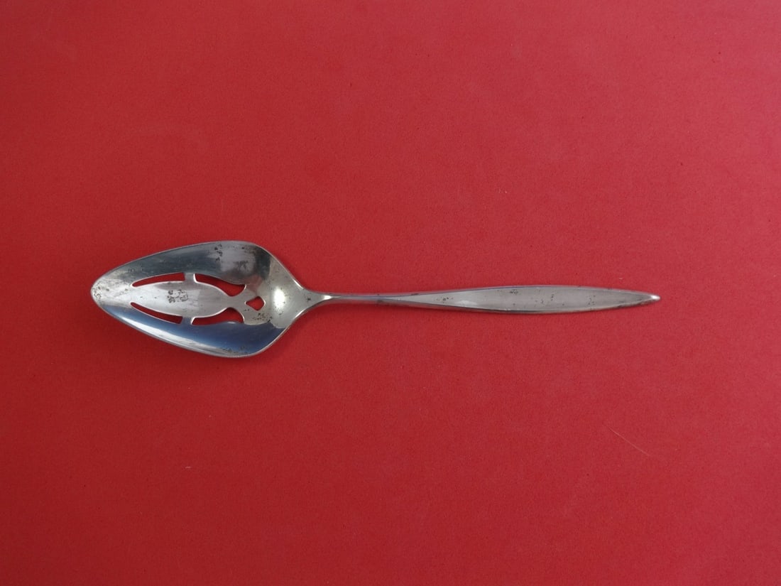 International Sterling Silver Crystal Pattern Slotted Serving Spoon 8 7/8": International Sterling Silver Crystal Pattern Slotted Serving Spoon 8 7/8" Presenting a stunning slotted serving spoon from the renowned Crystal pattern by International Sterling. Crafted from high-qu