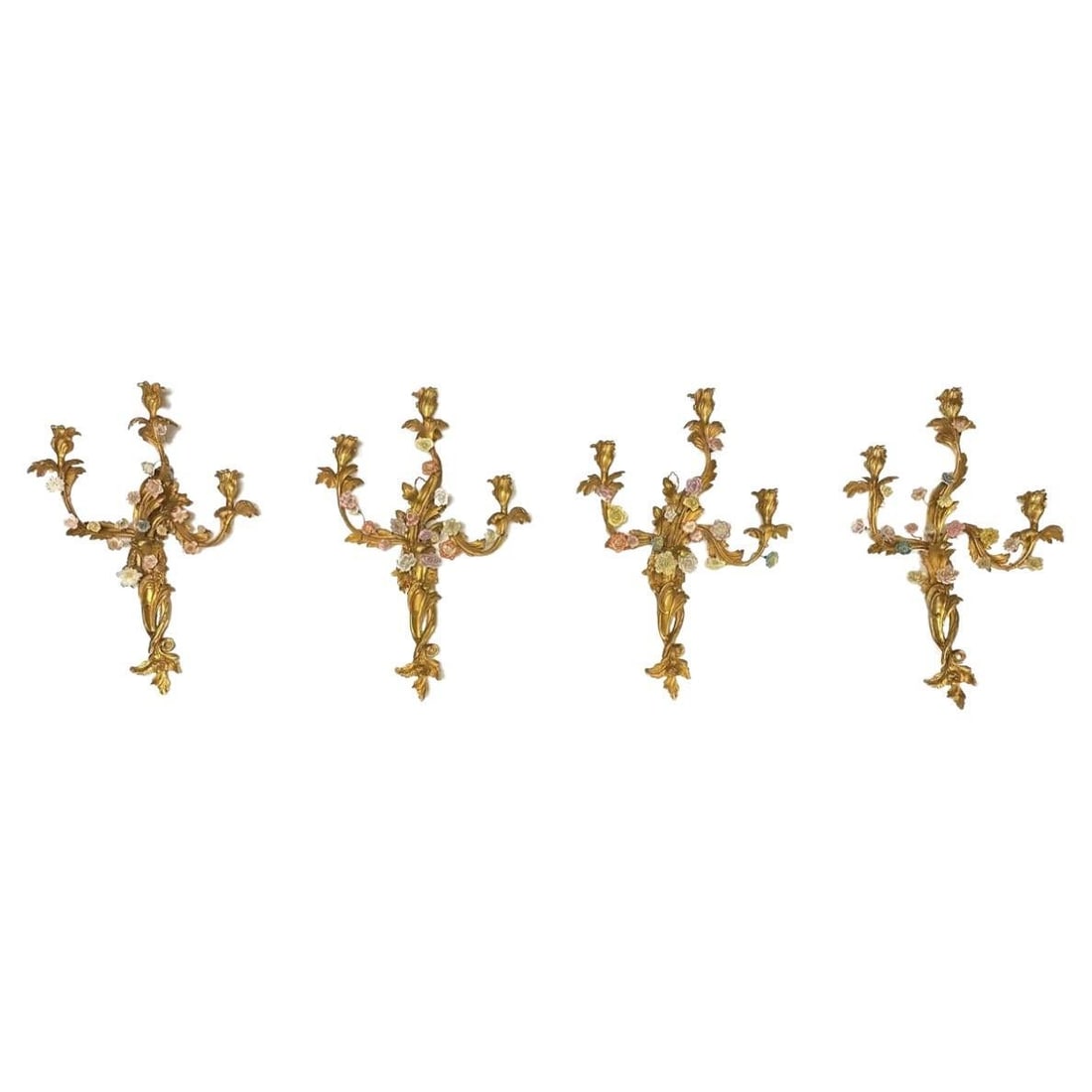 Four 19th Century French Louis XV Gilt Bronze and Porcelain Rococo Wall Sconces: Four 19th Century French Louis XV Gilt Bronze and Porcelain Rococo Wall Sconces This set of four French wall sconces features gilt bronze construction in the Louis XV Rococo style, each adorned with m