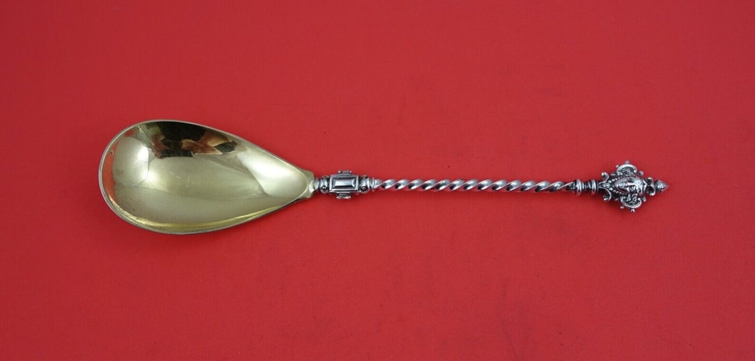 German Sterling Preserve Spoon .800 Silver Twisted Handle Figural Mask 8 1/8": German Sterling Preserve Spoon .800 Silver Twisted Handle Figural Mask 8 1/8" This exquisite German Sterling Preserve Spoon showcases a beautifully twisted handle and a figural mask design. Crafted fr