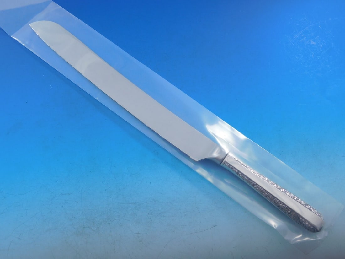 Towle Candlelight Sterling Silver Wedding Cake Knife 12" Custom Made: Towle Candlelight Sterling Silver Wedding Cake Knife 12" Custom Made Elevate your wedding celebrations with this exquisite 12" wedding cake knife from the Candlelight pattern by Towle. Crafted from st