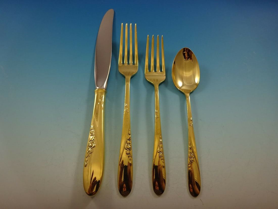 Easterling Rose Spray Vermeil 4pc Sterling Silver Place Setting: Easterling Rose Spray Vermeil 4pc Sterling Silver Place Setting Enhance your dining experience with this elegant 4-piece place setting in the Rose Spray Vermeil pattern by Easterling. Crafted from hig