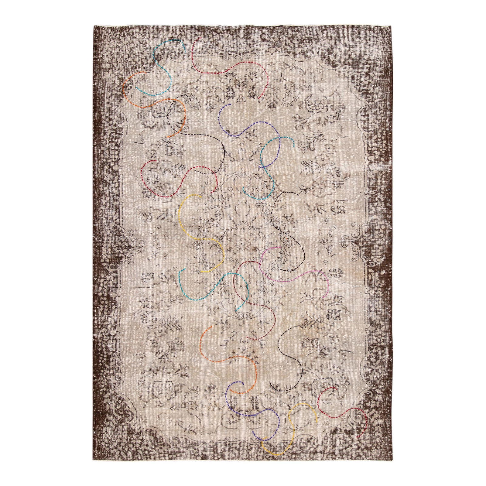Vintage Overdye Ivory Floral Wool Rug 6'4 x 9'3 Handmade: Vintage Overdye Ivory Floral Wool Rug 6'4 x 9'3 Handmade Discover the charm of this Vintage Overdye Handmade Ivory Floral Wool Rug. Featuring a beautiful beige field, this rug is adorned with a stunni