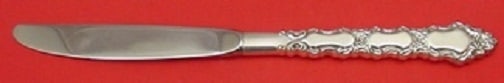 International Grand Trianon Sterling Silver 9" Place Size Knife: International Grand Trianon Sterling Silver 9" Place Size Knife Introducing the Grand Trianon Place Size Knife, crafted by International Sterling. This exquisite knife features a hollow handle made fr