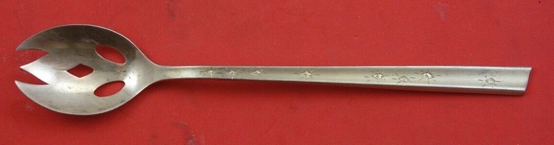 Stieff Sterling Silver Diamond Star Olive Spoon 5.5 Inches: Stieff Sterling Silver Diamond Star Olive Spoon 5.5 Inches This elegant serving spoon is an original piece from Stieff, crafted in sterling silver and featuring the exquisite Diamond Star pattern. Mea