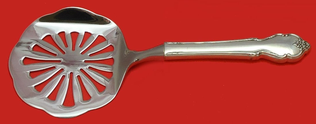 International Sterling Silver Tomato Server Breton Rose Custom Made 8.5": International Sterling Silver Tomato Server Breton Rose Custom Made 8.5" This exquisite tomato server features the elegant Breton Rose pattern by International Sterling. Crafted from high-quality ster