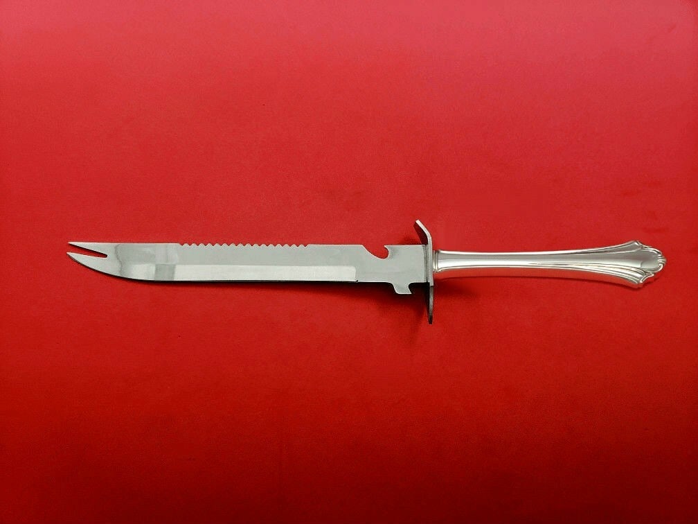 Lunt Bel Chateau Sterling Silver Ham Slice Custom Knife 11 1/2": Lunt Bel Chateau Sterling Silver Ham Slice Custom Knife 11 1/2" Introducing the Bel Chateau Ham Slice by Lunt, a stunning piece crafted from high-quality sterling silver. This custom-made knife showca