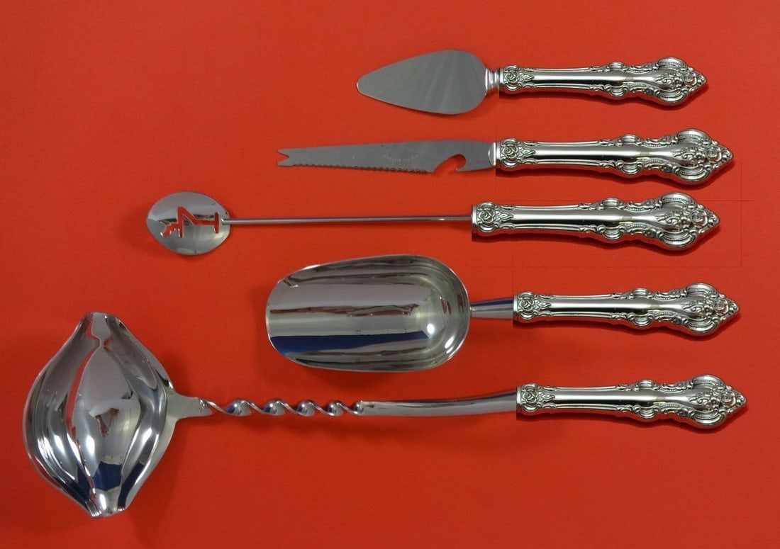 Towle El Grandee Sterling Silver 5pc Cocktail Party Bar Set: Towle El Grandee Sterling Silver 5pc Cocktail Party Bar Set Elevate your cocktail gatherings with the El Grandee by Towle Sterling Silver Cocktail Party Bar Set. This exquisite 5-piece set features a