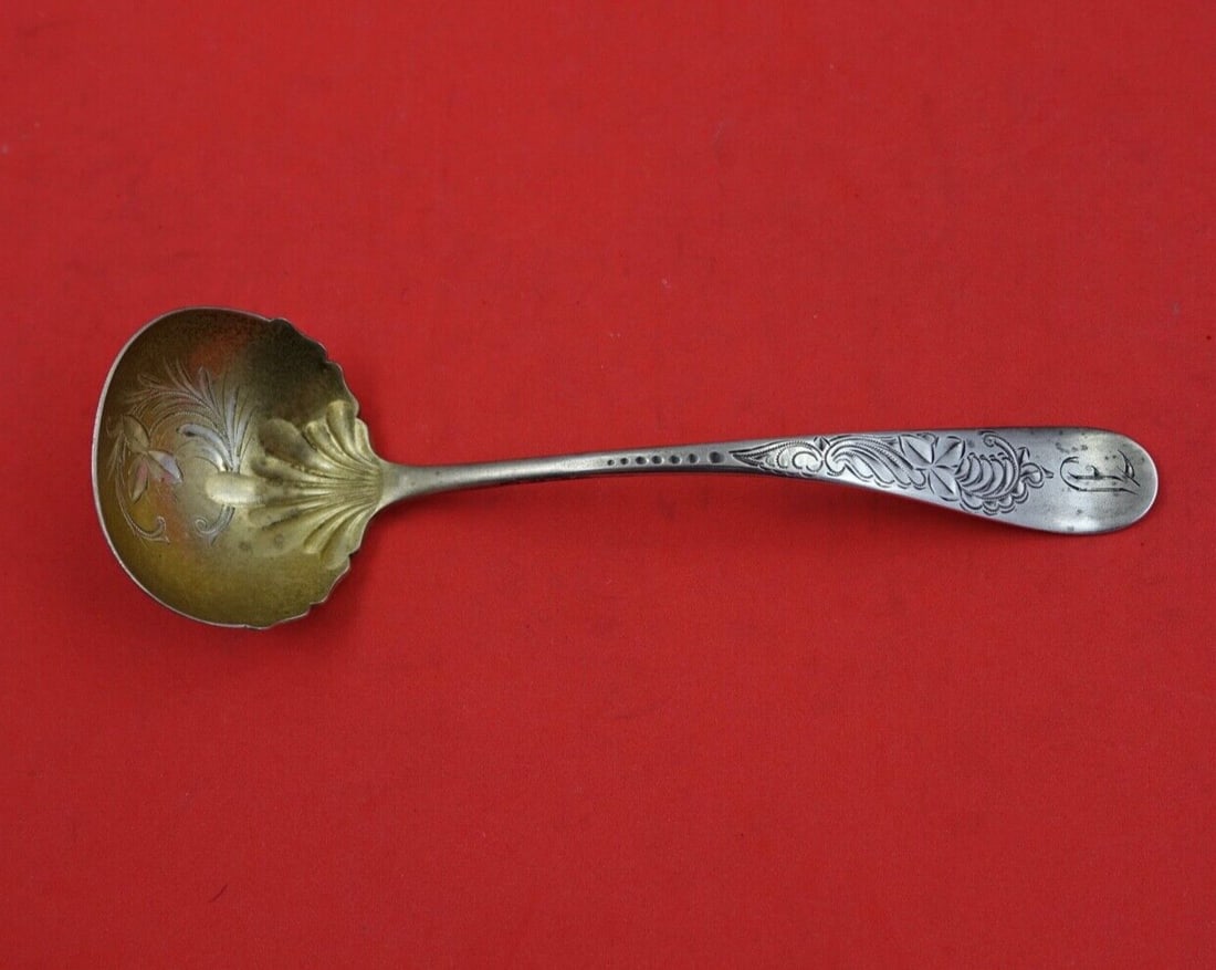 Towle Clifton Eng Sterling Silver Sauce Ladle Gold Wash Clover Design 6.5": Towle Clifton Eng Sterling Silver Sauce Ladle Gold Wash Clover Design 6.5" This exquisite Towle Clifton Eng Sterling Silver Sauce Ladle features a charming clover design in the bowl. Measuring 6 1/2 i
