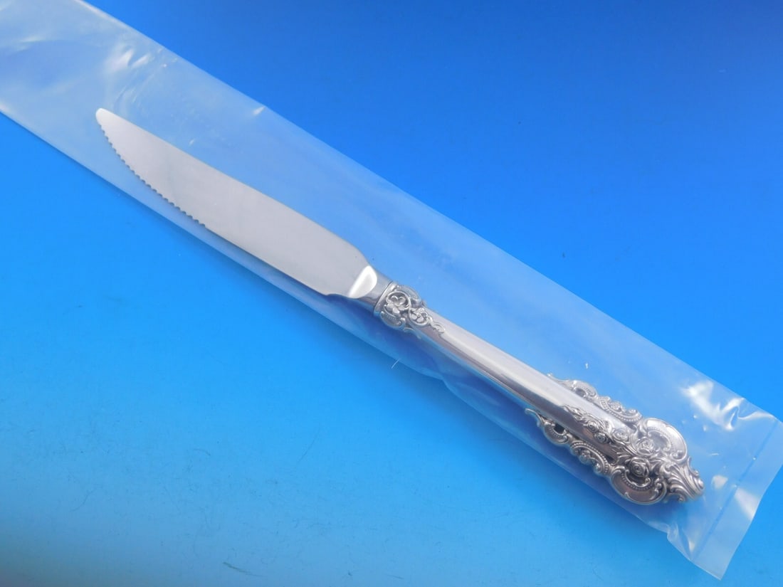 Wallace Grande Baroque Sterling Silver Steak Knife 9 1/4 Custom Serrated: Wallace Grande Baroque Sterling Silver Steak Knife 9 1/4 Custom Serrated Introducing the Grande Baroque by Wallace sterling silver steak knife, a beautifully crafted piece from the renowned Wallace br