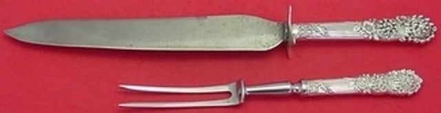 Reed & Barton Trajan Sterling Silver 2pc Roast Carving Set: Reed & Barton Trajan Sterling Silver 2pc Roast Carving Set Elevate your dining experience with this exquisite 2-piece roast carving set in the Trajan pattern by Reed & Barton. Crafted from premium ste