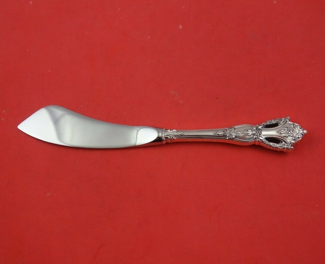 Tuttle Beauvoir Sterling Silver Master Butter Knife 6 7/8 inch Hollow Handle: Tuttle Beauvoir Sterling Silver Master Butter Knife 6 7/8 inch Hollow Handle Introducing the Beauvoir Master Butter Knife by Tuttle, a stunning piece crafted from sterling silver. This heirloom-qualit