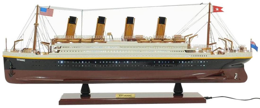 Illuminated Titanic Ship Replica Nautical Model 13H 32W 4D: Illuminated Titanic Ship Replica Nautical Model 13H 32W 4D Experience the elegance of maritime history with this detailed Titanic ship replica, featuring working lights that enhance its stunning desig