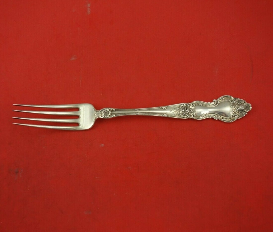 Wallace Meadow Rose Sterling Silver Fork 7 1/8" with 7/8" Tines: Wallace Meadow Rose Sterling Silver Fork 7 1/8" with 7/8" Tines This exquisite Meadow Rose fork from Wallace is crafted from high-quality sterling silver and features a charming floral pattern. With a