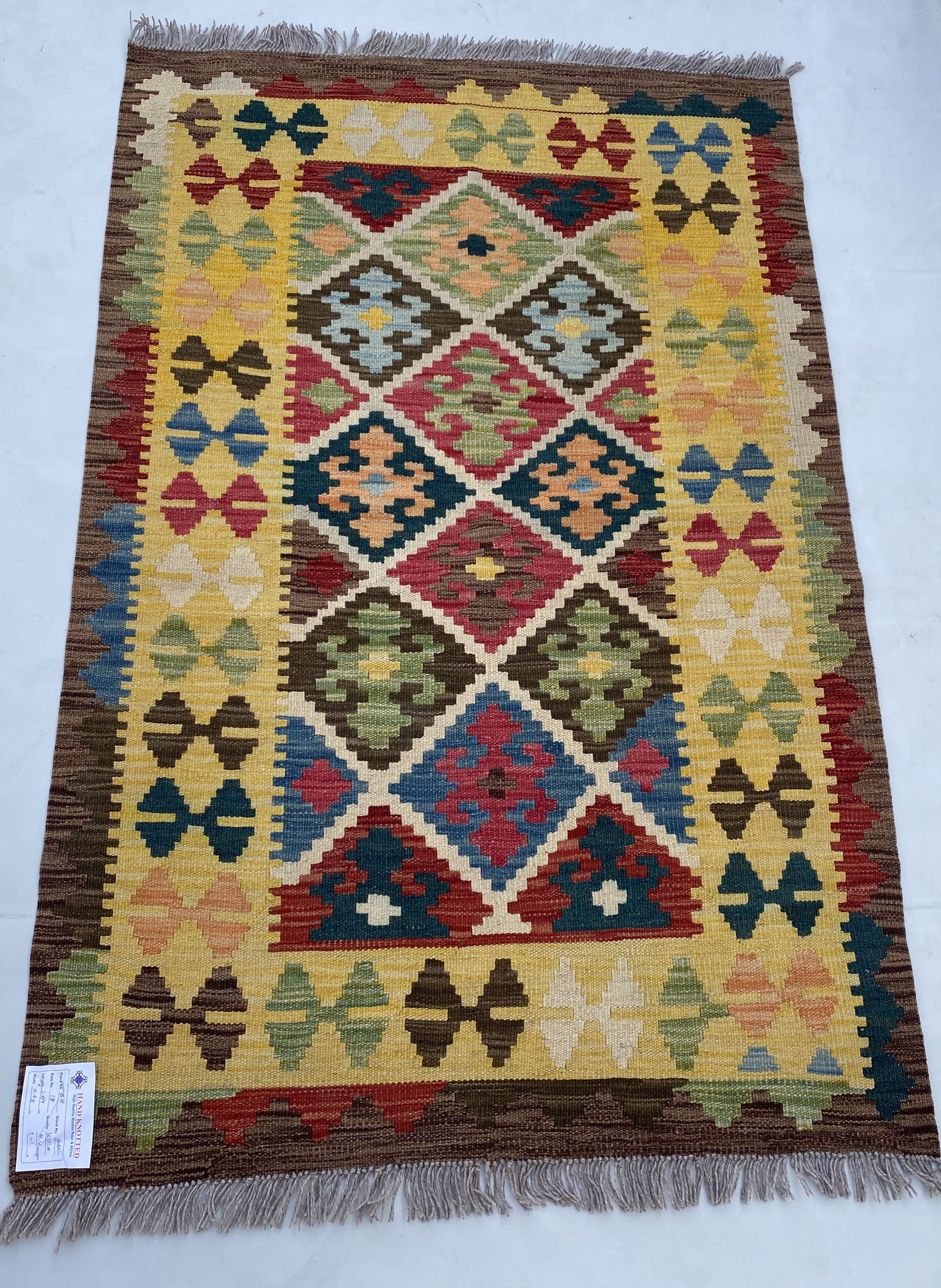 3' x 5' Multi-Color Handmade Geometric Kilim Rug from Afghanistan: 3' x 5' Multi-Color Handmade Geometric Kilim Rug from Afghanistan Free continental US Shipping Introducing the stunning 3' x 5' Multi-Color Handmade Geometric Design Kilim Rug, a true masterpiece of t