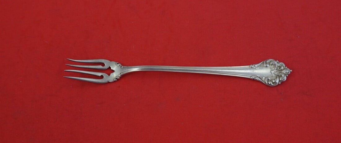 Reed & Barton Elegante Sterling Silver 4-Tine Oyster Fork 5.5 Inch: Reed & Barton Elegante Sterling Silver 4-Tine Oyster Fork 5.5 Inch This exquisite oyster fork is part of the Elegante pattern by Reed and Barton, showcasing a classic 4-tine design. Crafted from high-