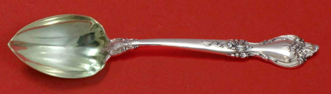 Lunt Delacourt Sterling Silver Fluted Grapefruit Spoon 5 3/4": Lunt Delacourt Sterling Silver Fluted Grapefruit Spoon 5 3/4" This Delacourt by Lunt grapefruit spoon is a stunning example of fine craftsmanship, made from high-quality sterling silver. The spoon fea