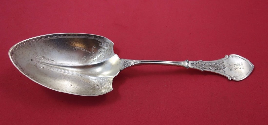 Koehler & Ritter Alameda Sterling Silver Berry Spoon 9.25 Inch: Koehler & Ritter Alameda Sterling Silver Berry Spoon 9.25 Inch This exquisite Sterling Silver Berry Spoon features the Alameda pattern, also known as Ivy, crafted by Koehler & Ritter. The spoon measur