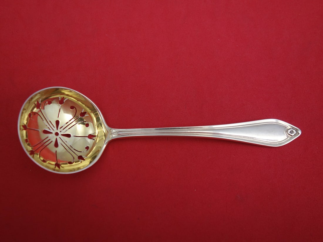 English Sterling Silver Goldwashed Sugar Sifter 5 3/8 Inch: English Sterling Silver Goldwashed Sugar Sifter 5 3/8 Inch This exquisite English Sterling Silver Sugar Sifter features a goldwashed finish, measuring 5 3/8 inches in length. Crafted from high-quality