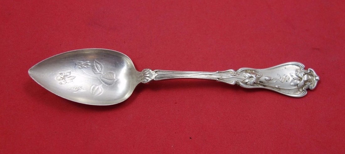 Whiting Violet Sterling Silver Fruit Spoon 5 1/4 Inches: Whiting Violet Sterling Silver Fruit Spoon 5 1/4 Inches This elegant fruit spoon, crafted by Whiting, features the beautiful "Violet" pattern, showcasing delicate flowers in the bowl. Measuring 5 1/4