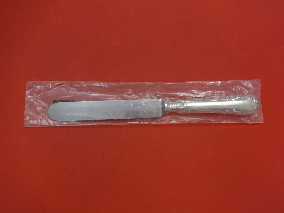 Cassetti Fleuri Sterling Silver Dinner Knife 10.25" New: Cassetti Fleuri Sterling Silver Dinner Knife 10.25" New Elevate your dining experience with this exquisite Fleuri by Cassetti Sterling Silver Dinner Knife. Crafted from high-quality sterling silver, t