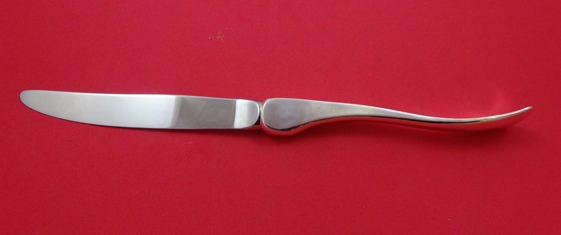 Karamojong Dinner Knife by Old Newbury Crafters Sterling Silver 10 1/4": Karamojong Dinner Knife by Old Newbury Crafters Sterling Silver 10 1/4" This exquisite Karamojong dinner knife by Old Newbury Crafters is crafted from high-quality sterling silver, ensuring both elega