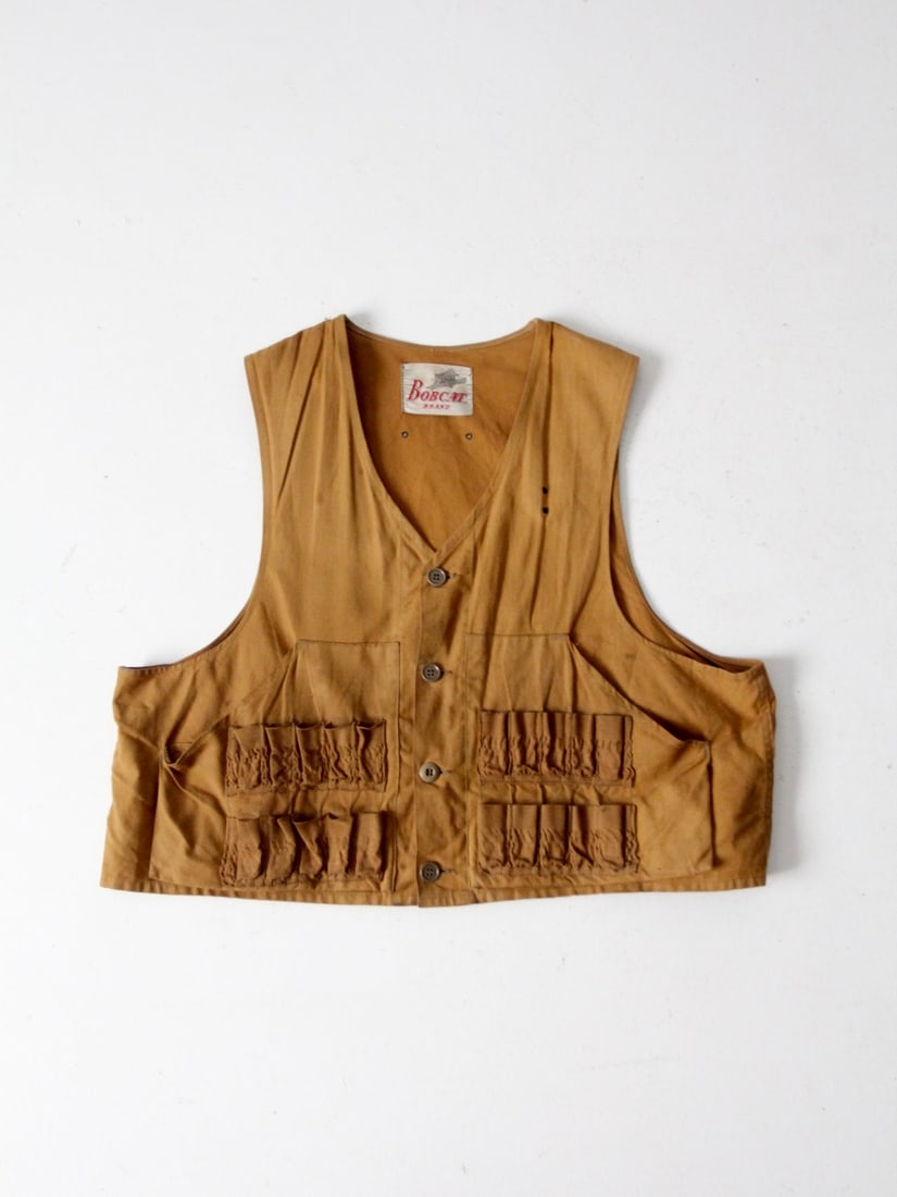 Vintage 1960s Bobcat Canvas Duck Hunting Vest XL: Vintage 1960s Bobcat Canvas Duck Hunting Vest XL Discover a classic piece of outdoor apparel with this Vintage 1960s Bobcat Brand Hunting Vest. Crafted from durable canvas duck material, this vest is