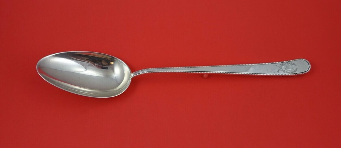 Shreve & Co. Beaded Sterling Silver Stuffing Spoon 11.5": Shreve & Co. Beaded Sterling Silver Stuffing Spoon 11.5" This exquisite serving spoon features a stunning beaded design by Shreve & Co. Crafted from high-quality sterling silver, this stuffing spoon m