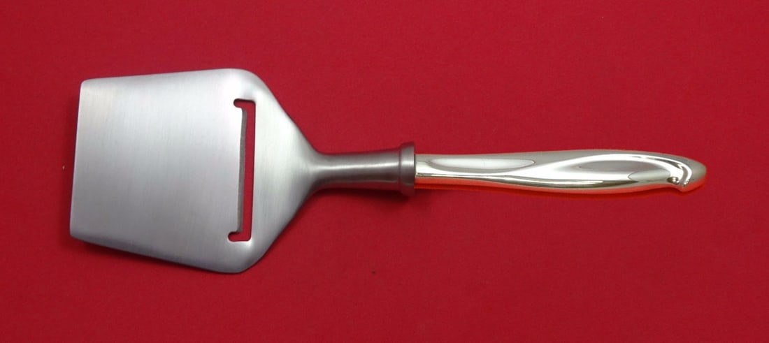 Reed & Barton Sterling Silver Cheese Plane Silver Sculpture Custom 8 1/4": Reed & Barton Sterling Silver Cheese Plane Silver Sculpture Custom 8 1/4" This exquisite cheese plane from Reed & Barton showcases the Silver Sculpture pattern, a testament to fine craftsmanship. Made