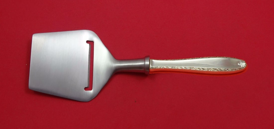 Alvin Southern Charm Sterling Silver Cheese Plane Custom 8 1/4": Alvin Southern Charm Sterling Silver Cheese Plane Custom 8 1/4" Elevate your serving experience with this exquisite Southern Charm cheese plane by Alvin. Crafted from high-quality sterling silver, thi